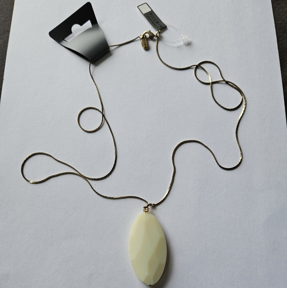 Pilgrim ivory oval goldtoned 30" necklace . NWT